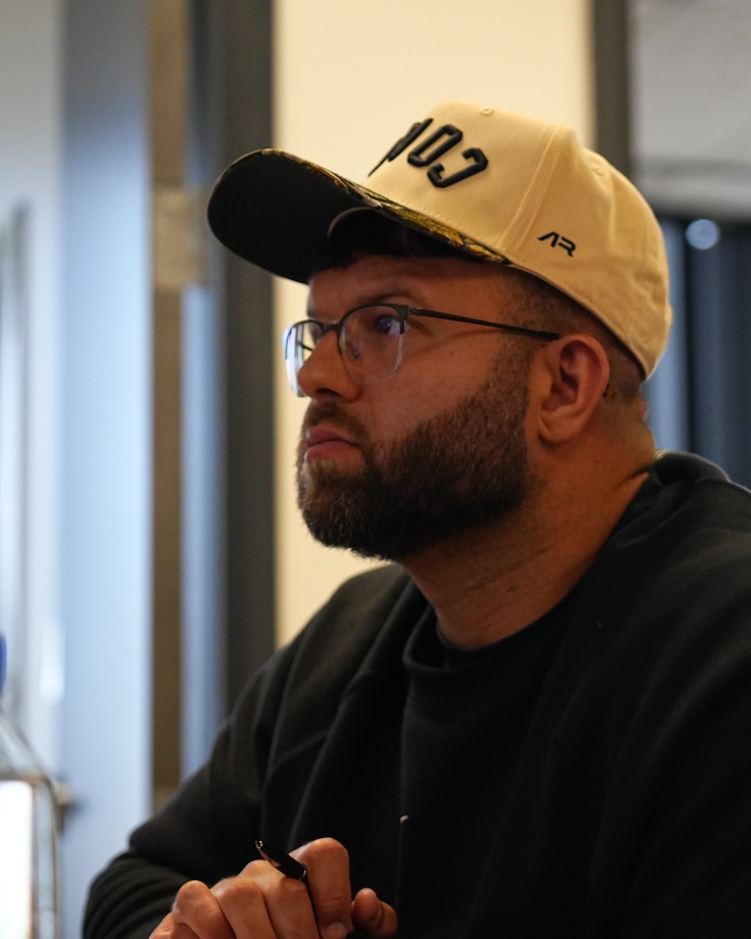 @pharmd_muscle wearing the AR COACH hat