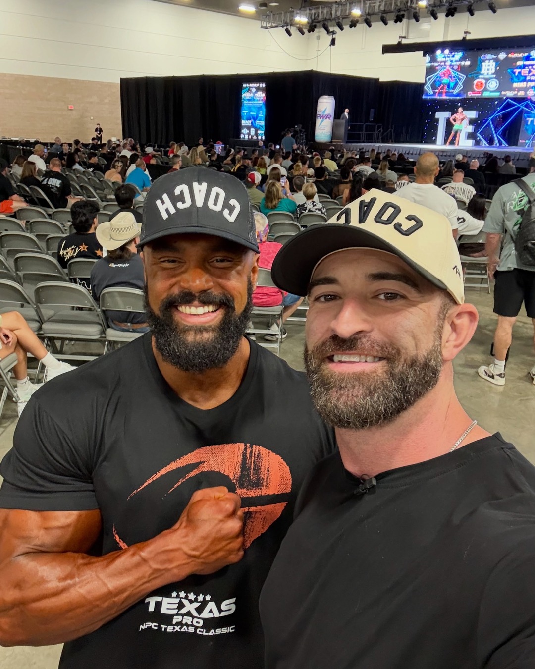 A coach wearing the AR COACH hat