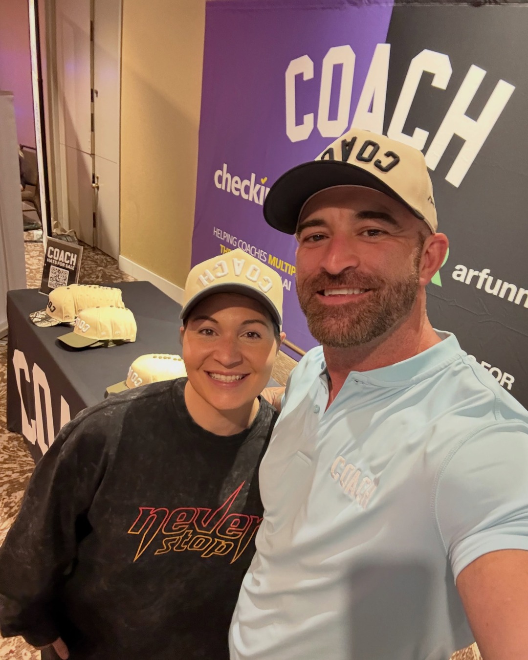 A coach wearing the AR COACH hat