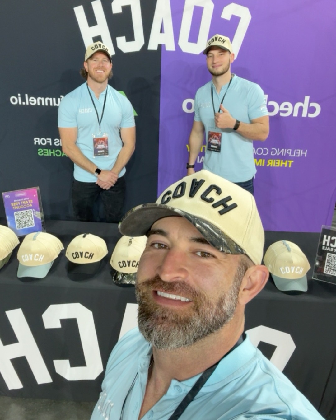 A coach wearing the AR COACH hat