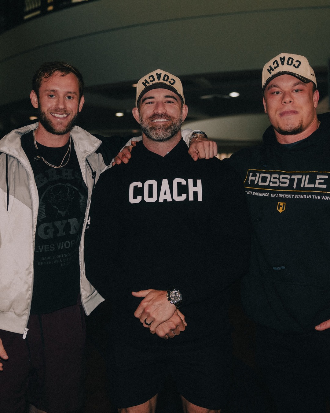 A coach wearing the AR COACH hat