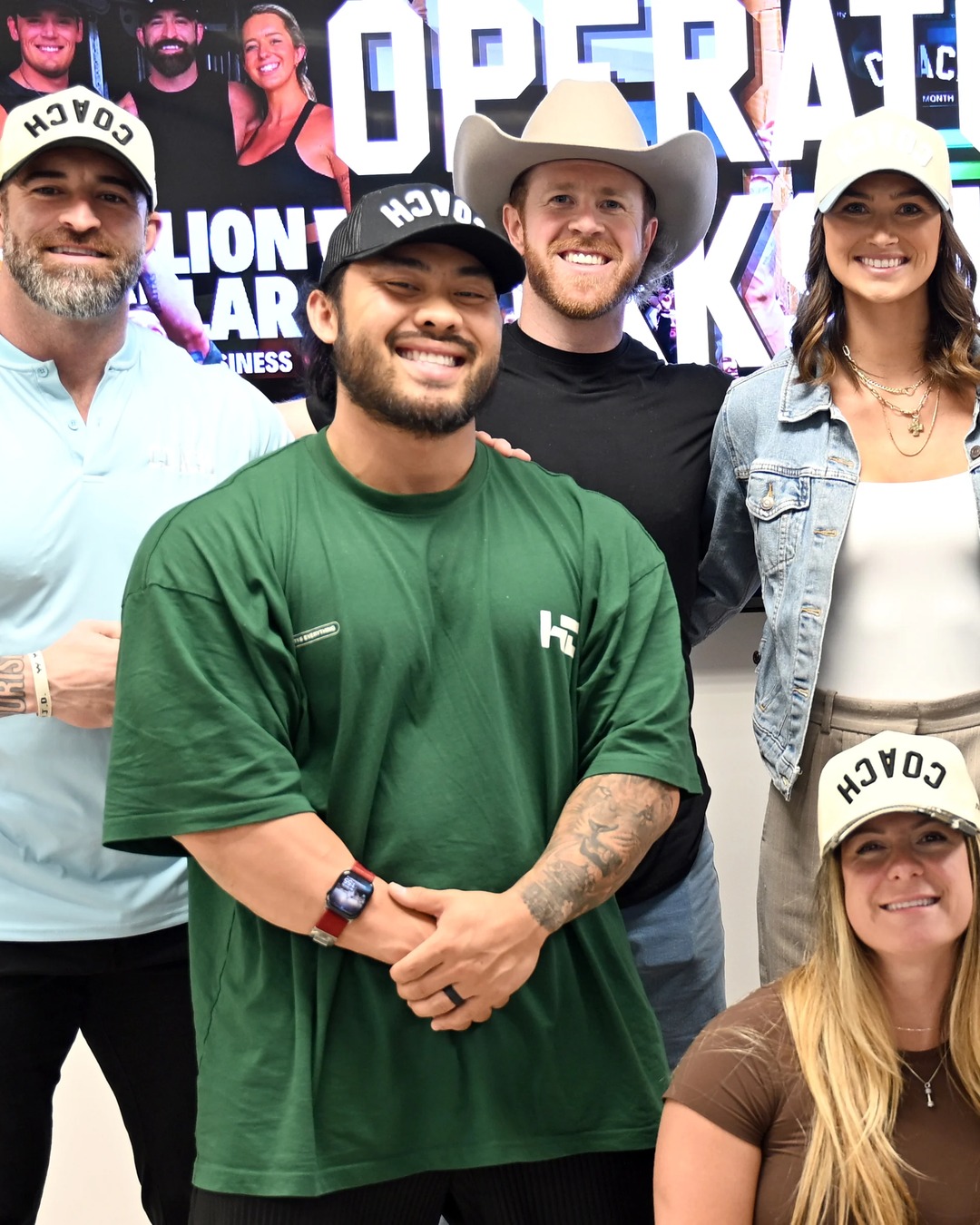 A coach wearing the AR COACH hat